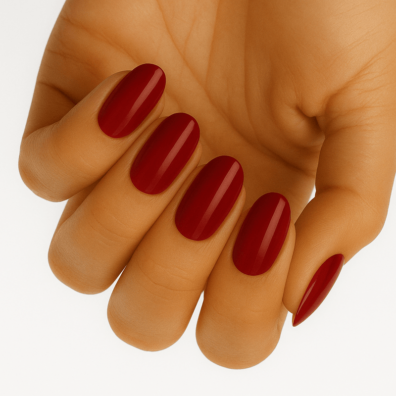 Deep burgundy matte gel nail wraps on hand showing elegant wine red manicure