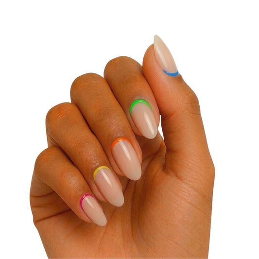 Nude gel nail wraps with colourful rainbow outline French tips on hand
