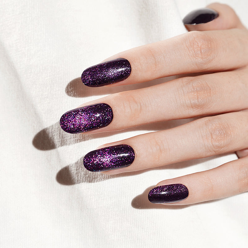 Deep purple semi-cured gel nail wraps with pink-violet glitter shimmer, glossy square finish.