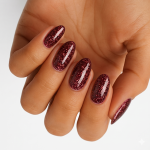 Deep burgundy glitter semi-cured gel nail wraps on almond-shaped nails