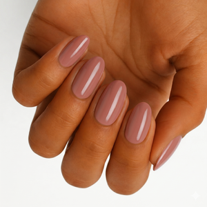 Mauve pink glossy semi-cured gel nail wraps on almond-shaped nails