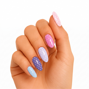 Multicolor pastel press-on nails with white polka dot pattern, glossy almond shape
