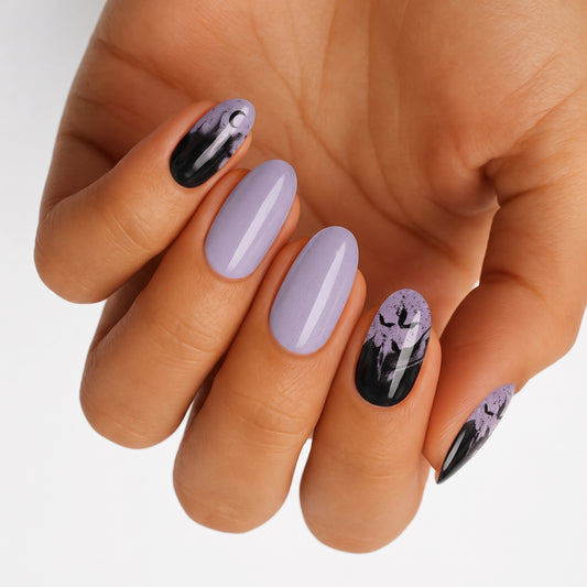Lavender semi-cured gel nail wraps with black smoky Halloween bat accent design