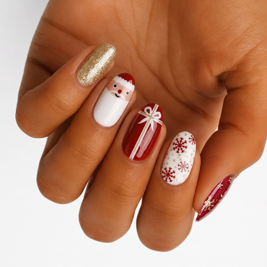 Holy Classics nail wraps with gold glitter, Santa face, red gift box and snowflake designs