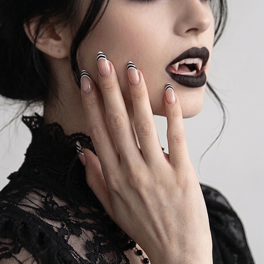 Nude press-on nails with double black striped French tip design, glossy finish