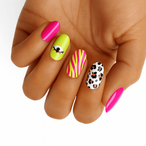 Bright pink lime green coral nail wraps with eye motifs and animal print on hand