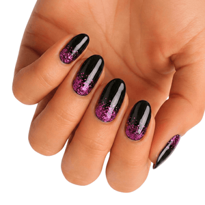 Black glossy nail wraps with pink glitter gradient tips worn on hand