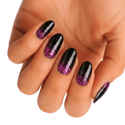 Black glossy nail wraps with pink glitter gradient tips worn on hand