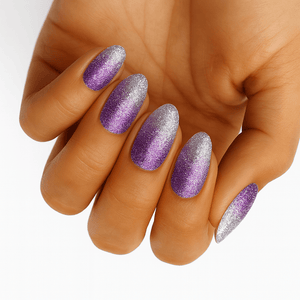 Purple lilac ombre glitter nail wraps on hand showing shimmer gradient effect
