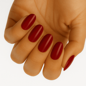 Deep burgundy matte gel nail wraps on hand showing elegant wine red manicure