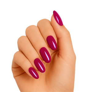 Bordeaux burgundy glossy gel nail wraps on hand showing deep red manicure